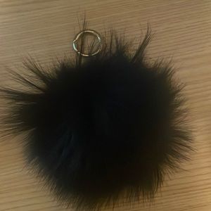 Black fur pom pom key chain Michael Kors